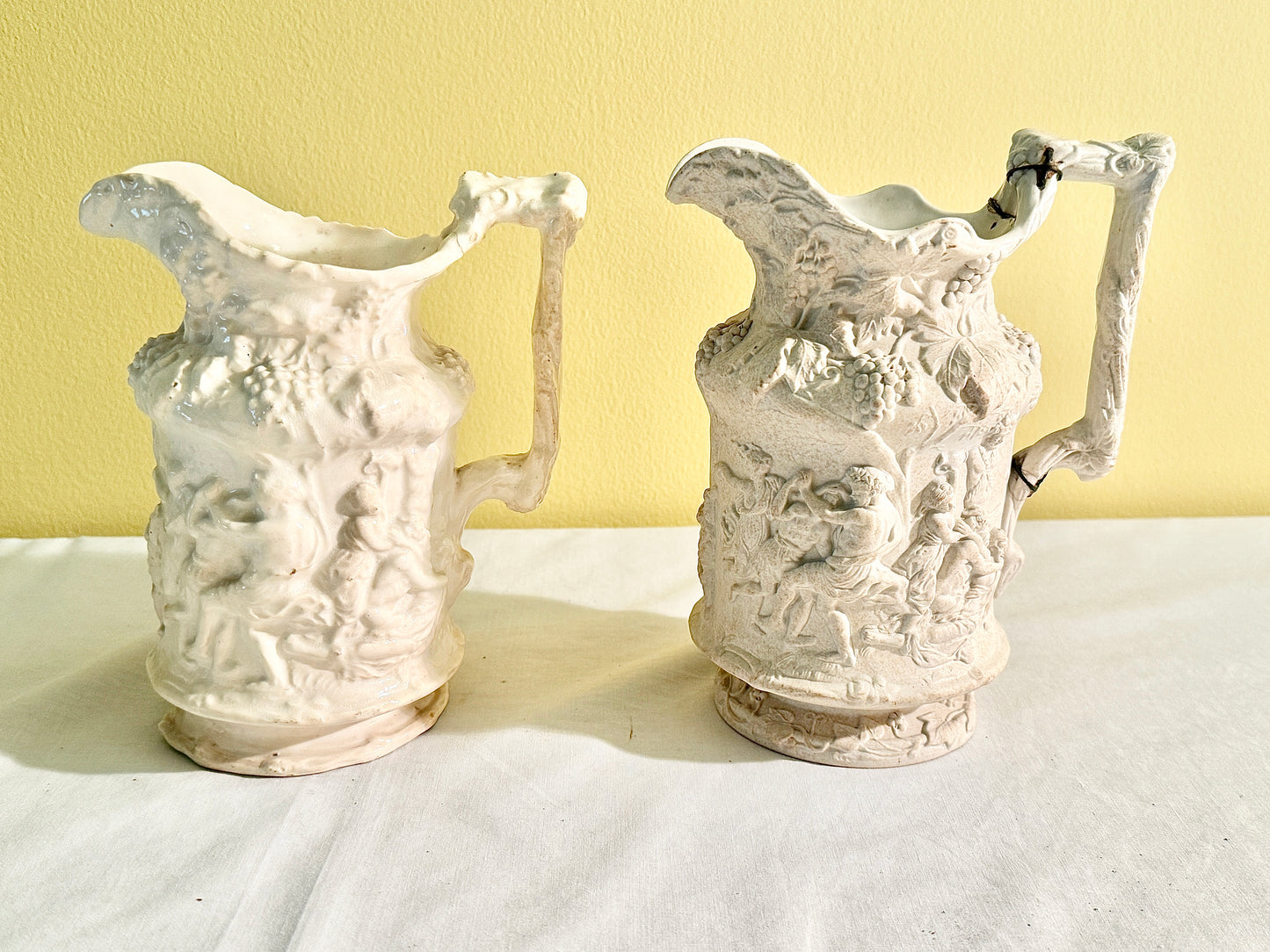 Pair of White Decorative Pitchers