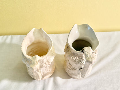 Pair of White Decorative Pitchers