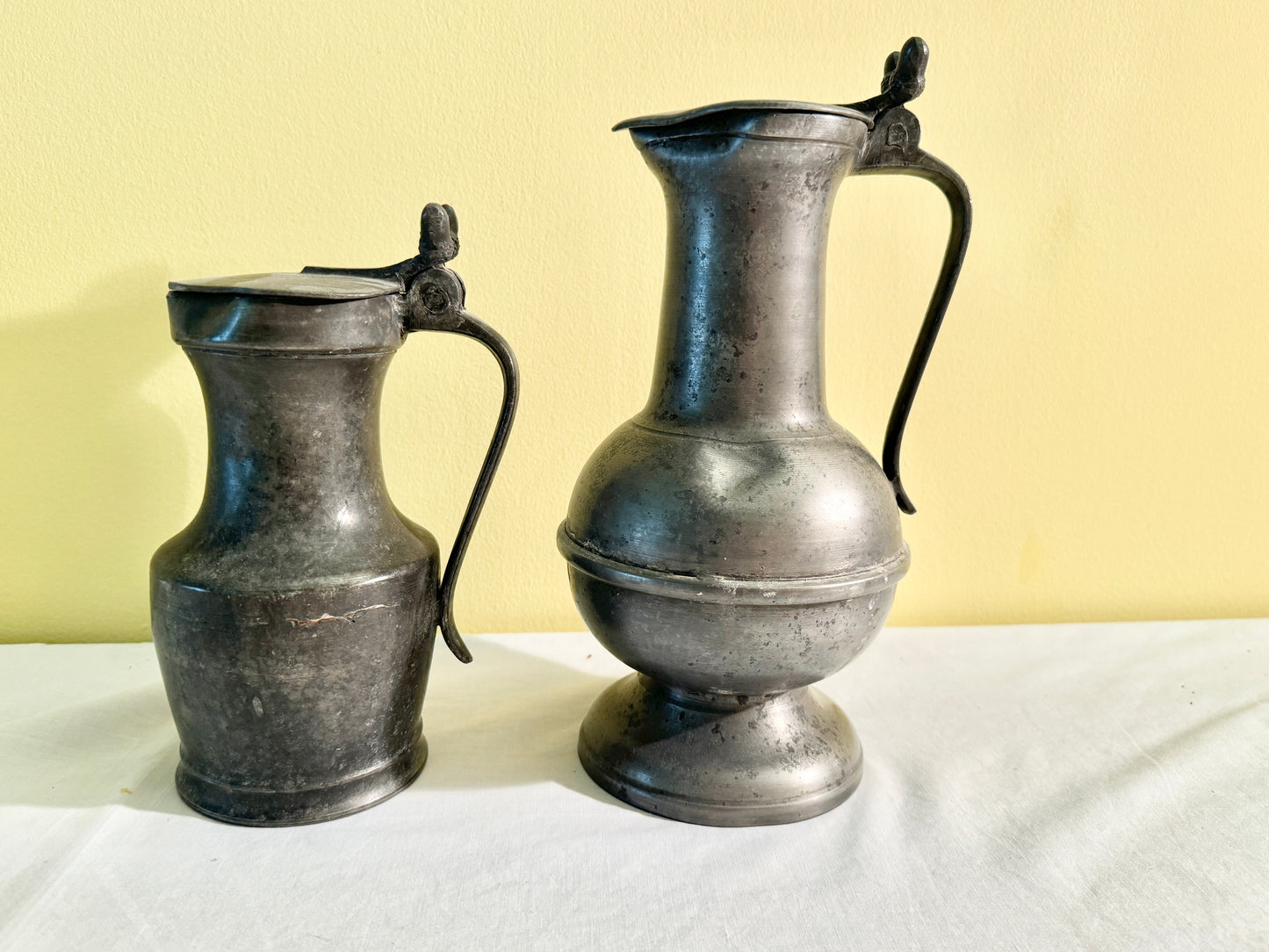 Pair of Lidded Pitchers