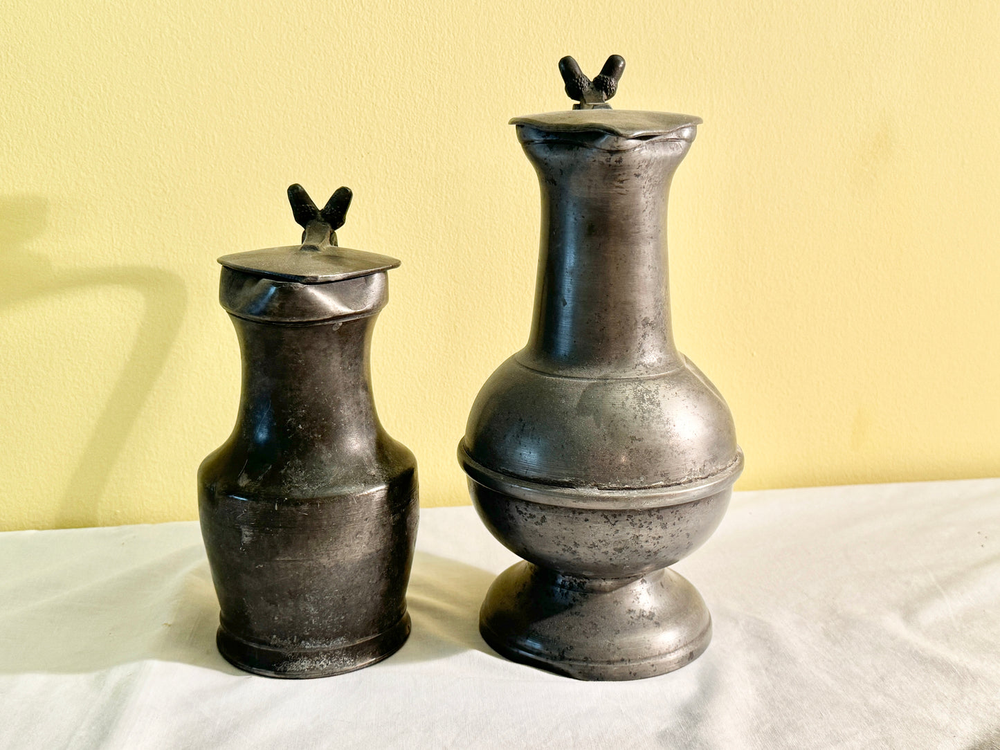 Pair of Lidded Pitchers