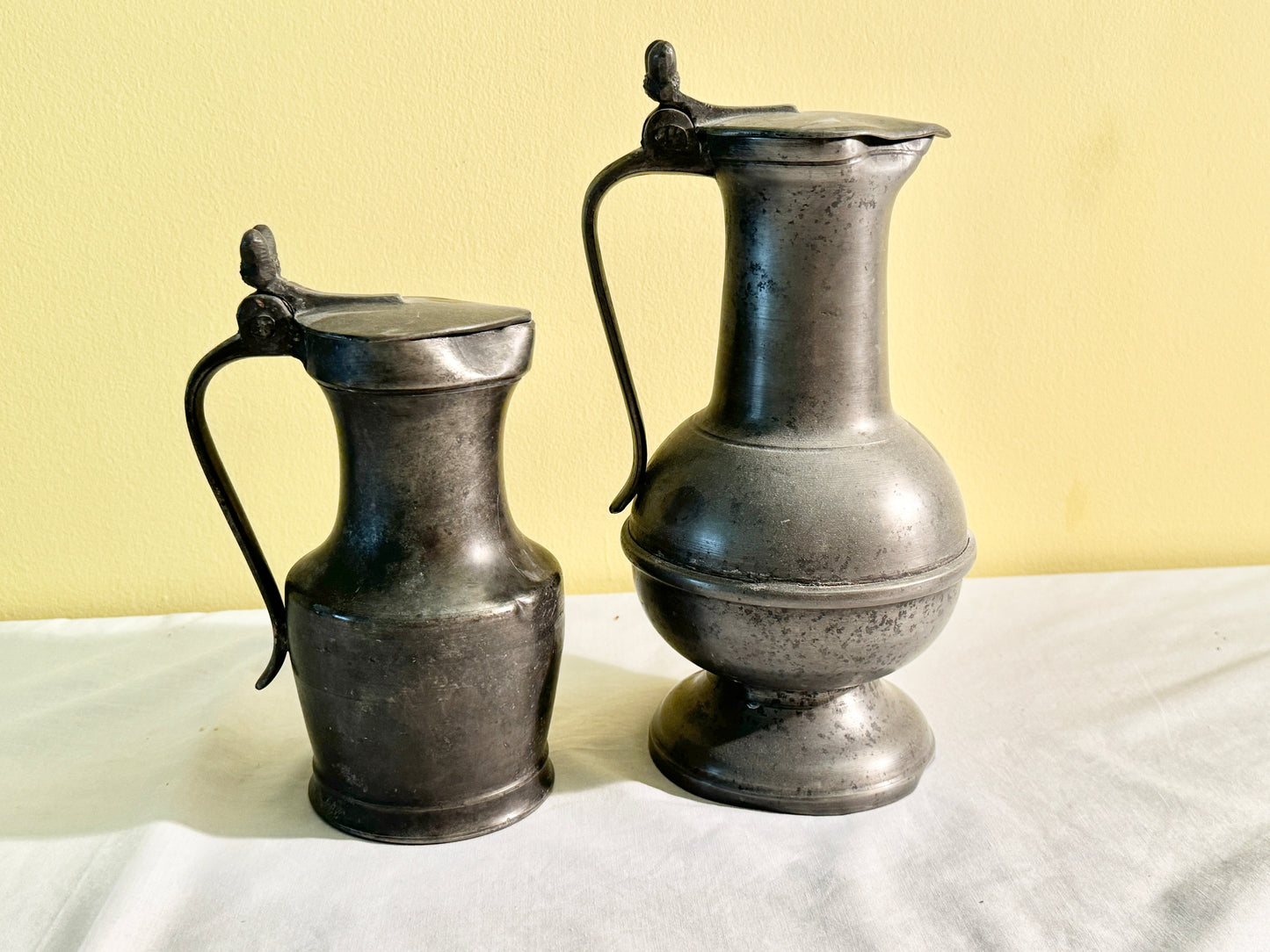 Pair of Lidded Pitchers