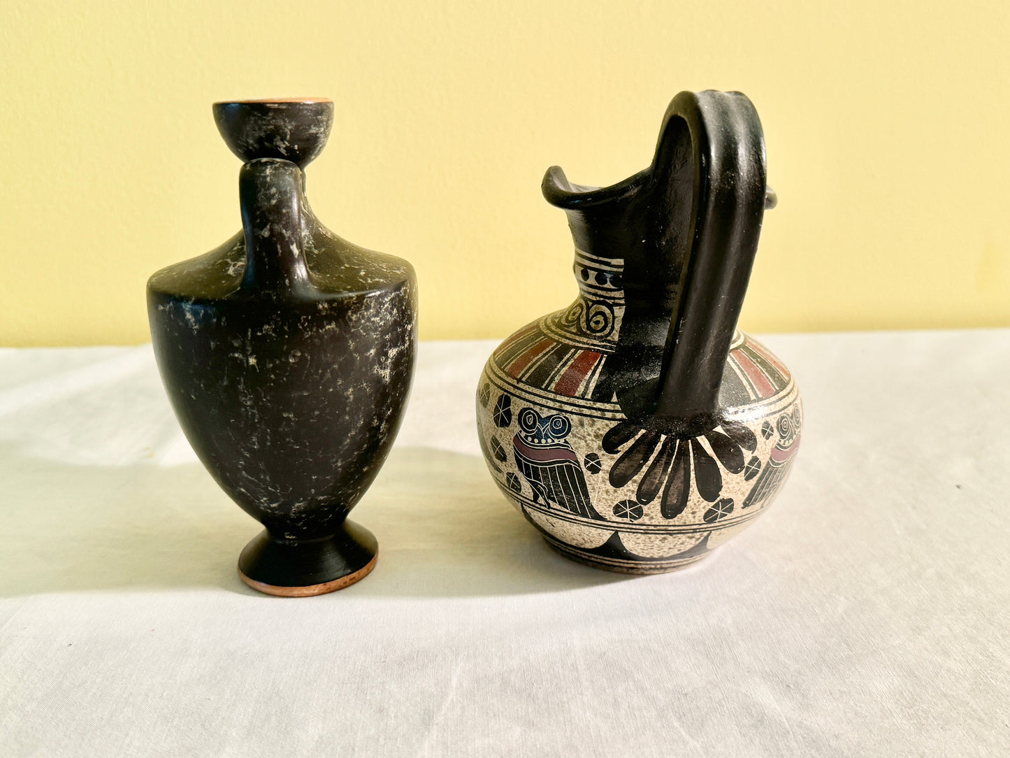 Pair of Black Greek Urn/Vases